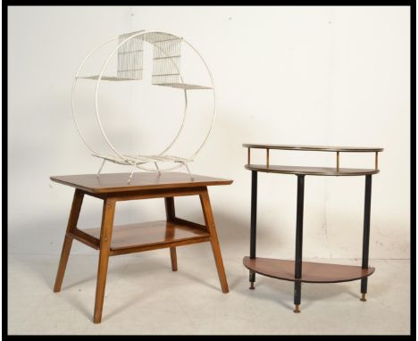 A vintage retro 20th century quarter panel veneered occasional table raised on tapered angular legs with shelf underneath. Al