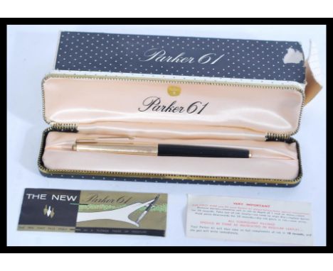 A vintage boxed Parker 61 cartridge fountain pen with rolled gold cap in original box complete&nbsp;with outer box and paperw