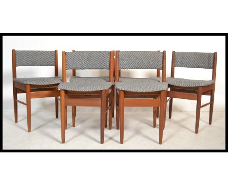 A set of six vintage retro 20th century teak chairs by Scandart having woollen back rests and seats raised on tapered support