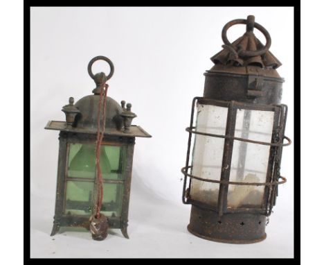 Two vintage early 20th Century porch lanterns, one of Arts and Crafts form with leaded panel glass together with another. Hig
