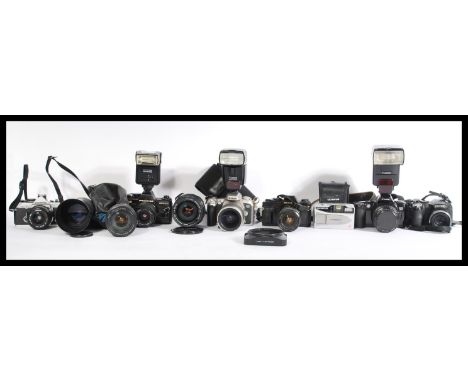 A group of vintage cameras and lenses to include Praktica , Carl Zeiss , Miranda , Nikon , Cannon etc. Please see images.
