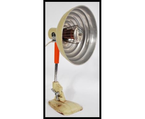 &nbsp;A vintage mid century Pifco heat lamp with UFO Space age style pendant shade raised on adjustable neck and cast metal b