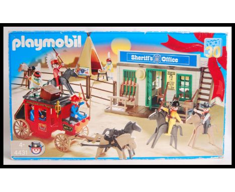 An original boxed vintage Playmobil Classic Western Cowboy play set no. 4431 , to include&nbsp; Sheriff's office , stage coac