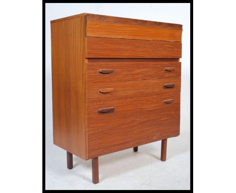 A vintage retro 20th Century teak chest of drawers, six graduating drawers raised on short tapering supports.&nbsp;Measures: 