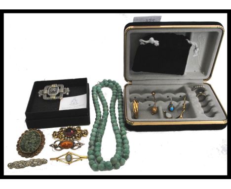 A group of vintage costume jewellery to include a jade type malacite necklace , gold tone metal brooch , opal , silver 925 ma