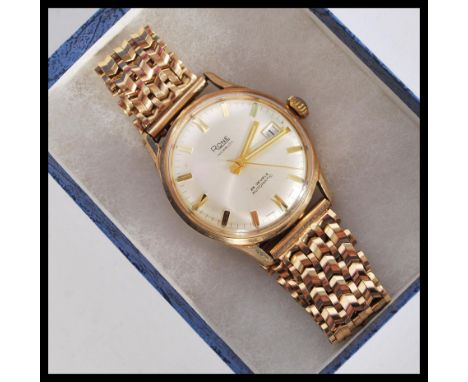 A vintage Rone 9ct gold watch having a 25 jewel movement. The silvered dial having gilt baton numerals and faceted hands. Sub