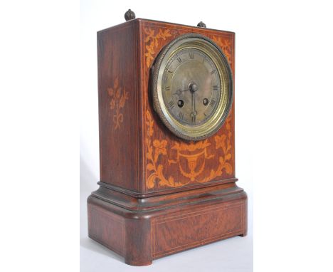 A vintage 19th century marquetry sea weed inlaid mantel clock with brass movement marked for Geraud A Paris. The movement str