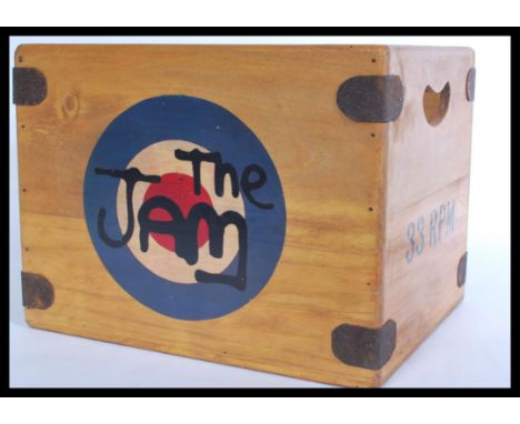 A vintage retro 20th century vinyl record storage box with logo for The Jam. Measures 28.5 cm high, 37 cm wide and 30 cm deep