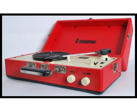 A Steepletone SRP025 retro vintage style portable vinyl record player with detachable speaker and carry handle to top.