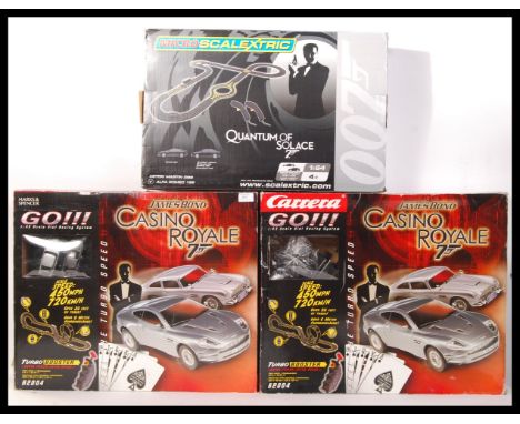 A collection of 2x James Bond Casino Royale 1:43 scale slot car racing system by Carrera GO!!! together with a 007 James Bond