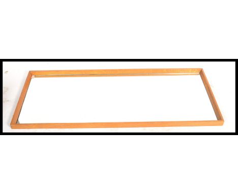 A vintage&nbsp; retro oversized wall hanging shop mirror, teak angular frame with a central mirror panel.&nbsp;Measures: 154c