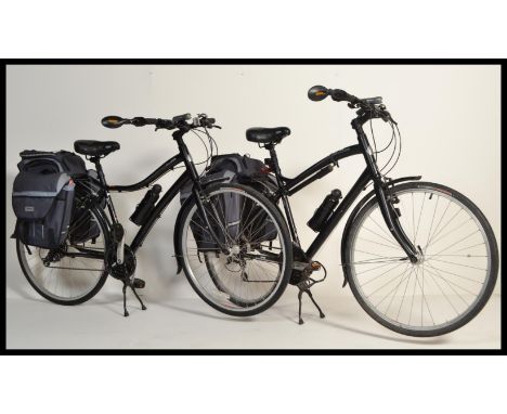 A pair of Specialized Globe Hybrid mountain bikes, His and Hers 28 speed, Shimano components, bicycle panniers, mud guards, t