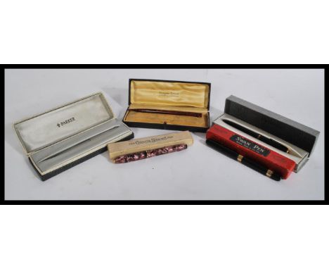 A group of vintage pens all in original boxes to include Cuzons limited , Swan , Conway Stuart 14ct gold , Parker 14ct gold e