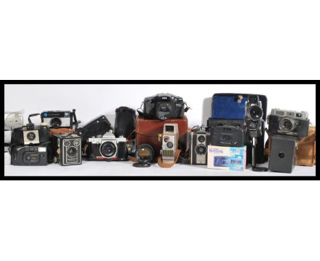 A collection of vintage cameras to include 35mm, box brownies, cine cameras etc please refer to images.