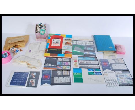 A group of vintage stamps loose and in albums. Two albums stocked with various English and other stamps with some loose kilow