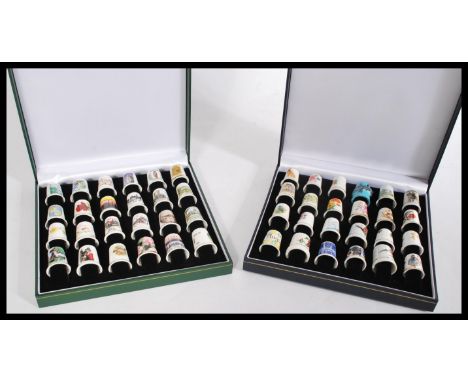 A collection of 48 ceramic bone China thimbles of different designs to include examples by Finsbury, Sutherland, Royal Albert