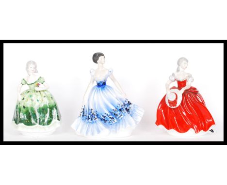 A group of three Coalport ceramic figurines of ladies to include Ladies of Fashion Blanche , Anna and Maureen. Highest measur