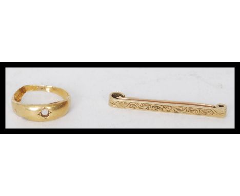 A 9ct gold vintage early 20th century Tie clip brooch with chased decoration along with a Hallmarked 18ct gold ring AF. Clip 