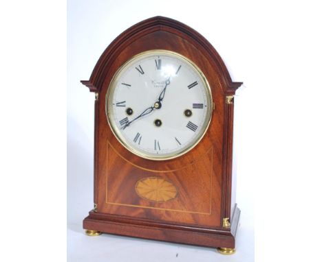 A 20TH CENTURY  Comitti of London  mahogany cased inlaid spire shaped mantel /bracket clock with inset brass Franz Hermle wes