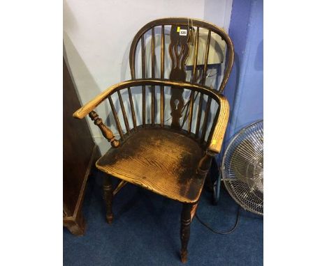 A stick back Windsor chair