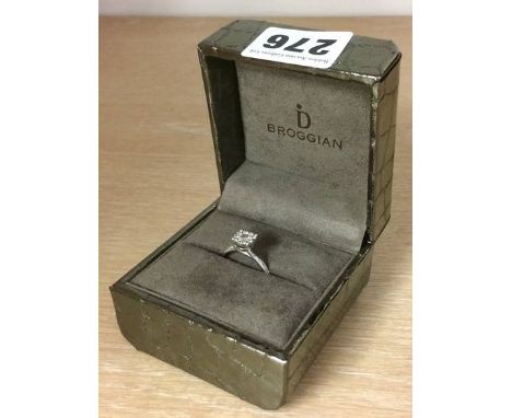 Diamond mounted white metal ring, stamped '750', 3.8g, size M