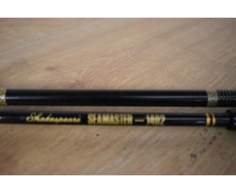 A Hardy Fibatube 6ft 6in boat fishing rod and another and a 1.7meter shakespeare seamaster boat rod with an unmarked reel
