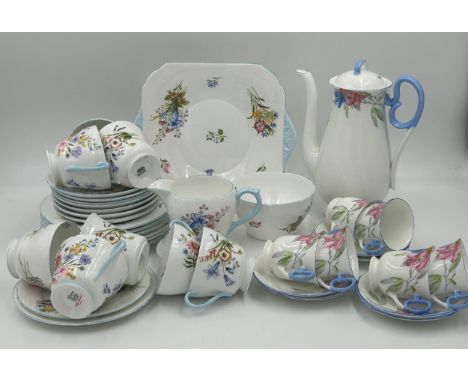 A Shelley part coffee set floral pattern V.2194 comprising of coffee pot and six cups and saucers along with a Shelley part t