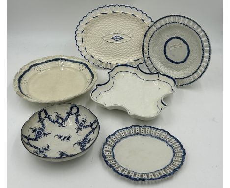 A group of early 19th century blue and white hand-painted pearlware moulded dessert wares, c. 1810. To include moulded desser