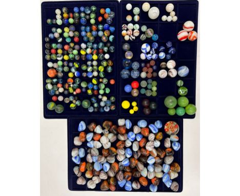 A quantity of approx. 200 marbles of different shapes and sizes together with approx. 100 various tumblestones.