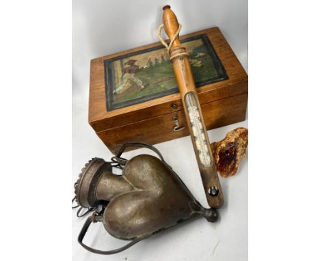 A miscellany to include oak box with painted top, church candle holder, a piece of amber and a boxwood cased thermometer.