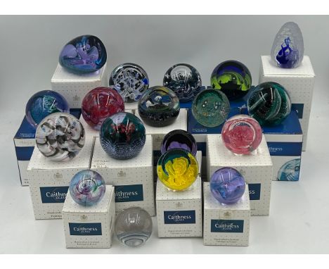 A large group of Caithness paperweights to include:  Wonderful World Wishing On a Star, Seabed Starfish, Retro Supernova, Jou
