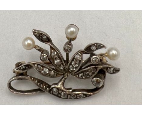 Diamond and seed pearl brooch set in unmarked yellow and white metal. Weight 3.2gm.