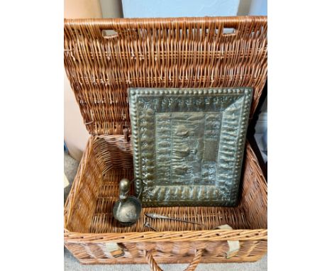 A wicker picnic basket and contents to include button hook, vesta case, brass Indian tray with elephant decoration.