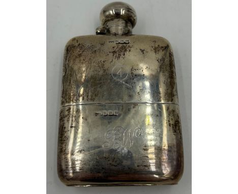 A hallmarked silver hip flask  by Charles Edwin Turner Birmingham 1913. Inscribed with a circled number 4 and the initials B 