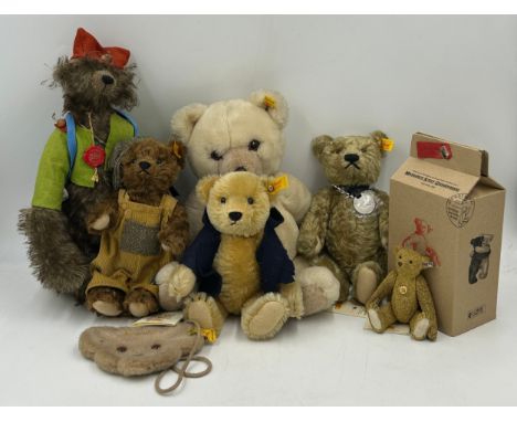A collection of Steiff Bears to include Classic (25) 1920 No.713 28cm, Classic (23) No.28649, Bear in Blue Jacket, Beige Bear