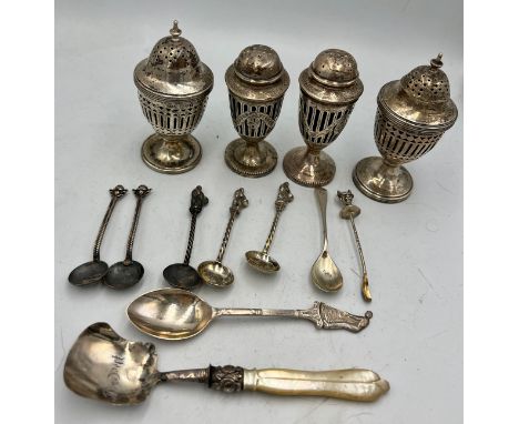 Four hallmarked silver pepperette, Chester 1910 maker Stokes &amp; Ireland Ltd and Chester 1913, maker George Nathan &amp; Ri