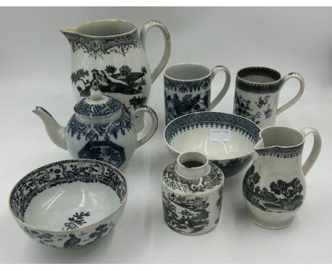 A group of early 19th century green/black and white transfer-printed wares, c. 1800-20. To include: two bowls, a tea caddy, a