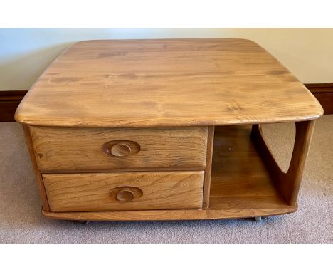 Ercol coffee table with two drawers on wheels. 80cm x 80cm x 39cm h.