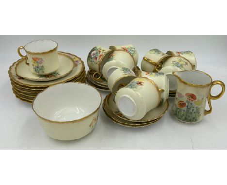 Continental hand painted part tea service decorated with poppies and gilt edges to include 6 x plates 18.5cm d, 10 x saucers 