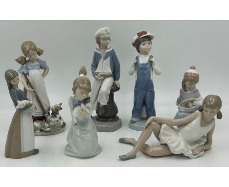 Lladro: Playful Kittens 5232, Sleeping Kitten 5712, Boy with yacht 4810, Boy From Madrid 4898, Girl with Pig 1011, Fridays Ch