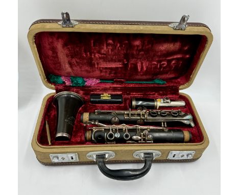 A Selmer London Console Steel Ebonite clarinet in case.