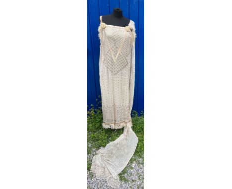 A vintage cream net and metallic silver embroidered dress made with Egyptian azute shawl with long train and silk lining with