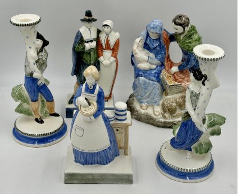 Five 20thC Rye Pottery to include a nativity scene approx. 28cm x 18cm high, a pair of candlesticks 28cm high, a lady baking 