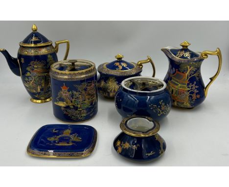 A small quantity of Carlton Ware ‘New Mikado’ pattern with blue ground items comprising : a lidded jar with brass seal mechan