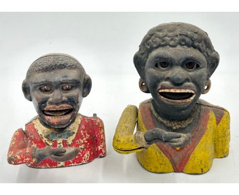 Two late 19thC Cast Iron Money Boxes 'Dinah' 16cm and smaller Man 13cm both with moving eyes and hand. (2). Notice from the t