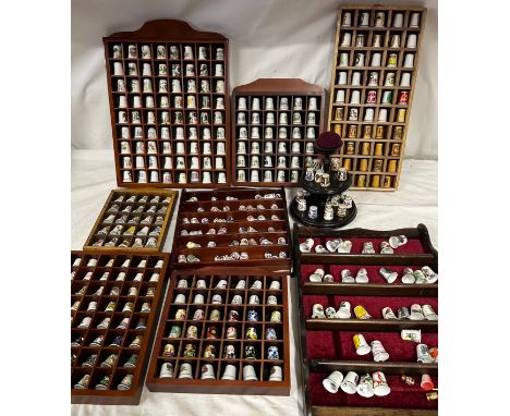 A large collection of approx. 360 thimbles to include 20 x Royal Crown Derby, 42 x Royal Worcester, 22 x wooden and the rest 