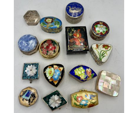 A collection of 15 various enamel, silver and lacquer pill boxes. (15)