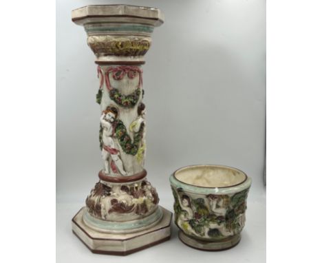 A Capodimonte jardinière (63cm) and planter (19cm) total height 82cm with makers mark to base.