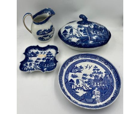 A group of 19th century blue and white transfer-printed early Willow pattern wares, c. 1800-20. To include:  a ewer, a desser