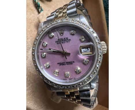 A ladies Rolex Oyster Perpetual Datejust 69173, stainless steel and gold bracelet wristwatch with diamond set bezel, pink mot